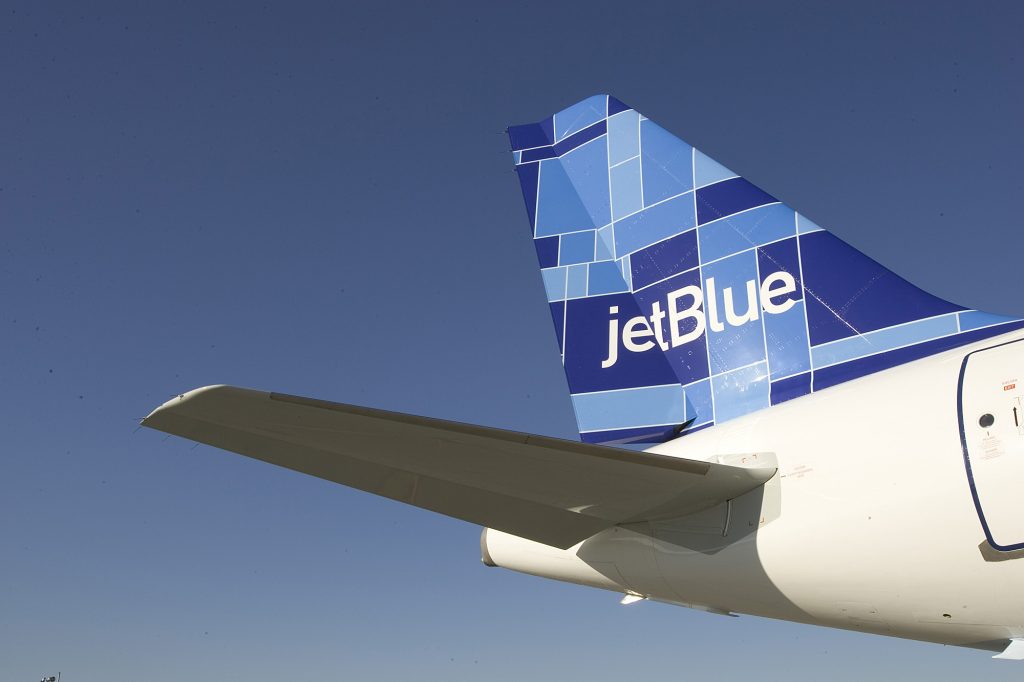 JETBLUE TURNS FIVE;  TAKES DELIVERY OF 71ST AIRBUS A320 New York, NY (February 11, 2005) Ð JetBlue Airways [NASDAQ: JBLU] today turned five.  The airline commenced service at New YorkÕs John F. Kennedy International Airport on February 11, 2000, with a ceremonial flight to Buffalo, NY, and back before taking its first commercial flight to Fort Lauderdale, FL, later that day.  Five years later, JetBlue is the largest airline at JFK and ranked as a ÒmajorÓ airline by the US Department of Transportation, having achieved annual revenues of more than a billion dollars. To mark the occasion, David Neeleman, JetBlueÕs Chairman and CEO, and Dave Barger, President and COO, hosted an event for JetBlue crewmembers and customers to greet the arrival of the airlineÕs 71st Airbus A320 aircraft, debuting the fleetÕs seventh tail fin design, Mosaic.  Earlier in the day, the airline gave away 500 free tickets throughout New York CityÕs five boroughs to support the charity City Harvest.  Ticket seekers had to dress as their favorite JetBlue destination and bring canned goods for the charity.